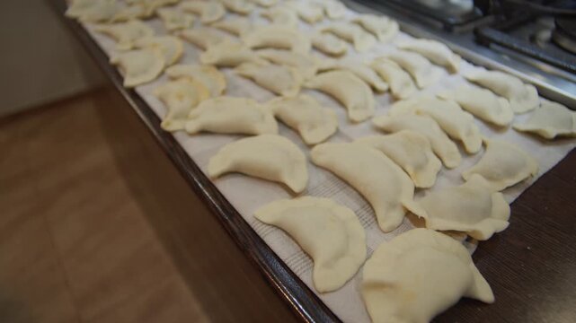 Making classic pierogi dumplings in traditional style