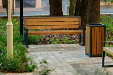 urban city square small empty place with trash can and bench on floor street tile in park outdoor © Artem Kniaz