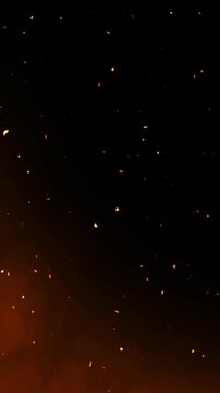 A splash of particles soaring above a black and orange background slow motion video in 4K resolution.