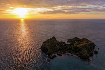 Fototapeta premium Aerial Sunset Drone View of Tanga Island, Nosy Be, Madagascar