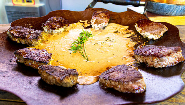 Traditional roasted buffalo meat dish prepared with water buffalo meat. Typical Brazilian cuisine from Maraj&oacute; Island, featuring rustic presentation and regional flavors.