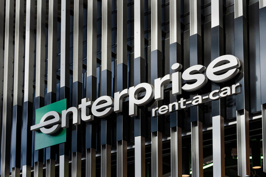 January 23, 2026, Amsterdam, Netherlands - Enterprise Rent-A-Car sign on a modern building facade