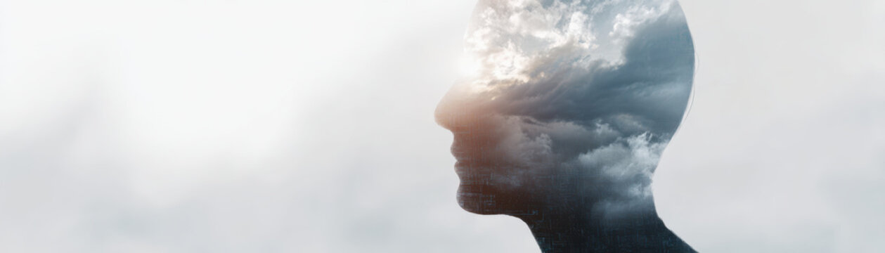 Digital literacy concept with human profile and cloudy sky overlay symbolizing knowledge and imagination in creative artistic style