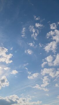 A stunningly beautiful cloudy sky overhead with bright and warm sunlight shining down