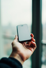 man holding a mobile phone
