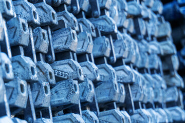 Repeating Pattern of Blue Weathered Industrial Metal Components - Heavy Machinery Parts,...