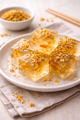 Ancient Chinese osmanthus jelly dessert, translucent texture, soft light
