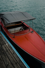 Obraz premium Red Classic Boat at Dock