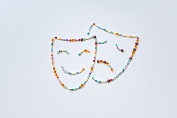 Obraz premium Happy and sad face made from pills, illustration