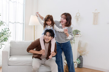 Family sharing joyful moments together in living room
