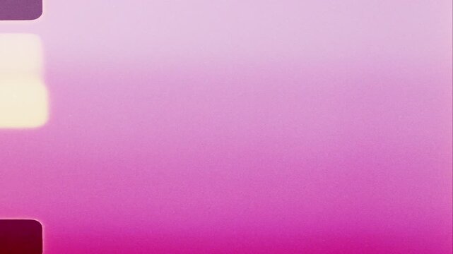 Analog film burn light overlay featuring natural grain, color bleed artifacts, and edge light leaks for cinematic visuals
