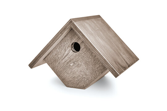 Wooden bird house on white background