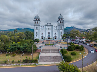 Fototapeta premium Beautiful aerial view of Basilica of Our Lady of Suyapa an its cemetery in Tegucigalpa, iconic religious landmark and national shrine of Honduras