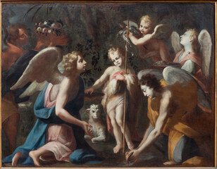 Naklejka premium BUSTO ARSIZIO, ITALY - JANUARY 19, 2026: The painting of child of St. John the Baptist - 