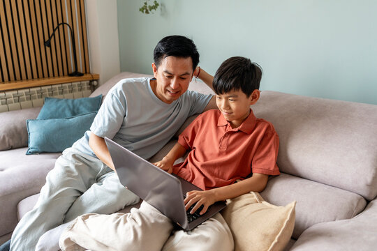 Father and son enjoying quality time at home