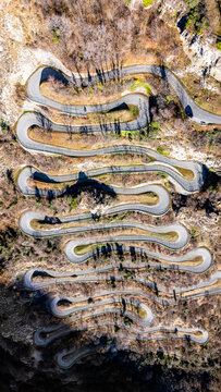 Aerial view of winding Montvernier road in autumn