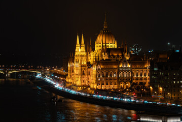 Obraz premium Hungarian Parliament Illuminated at Night Seen from Buda Castle