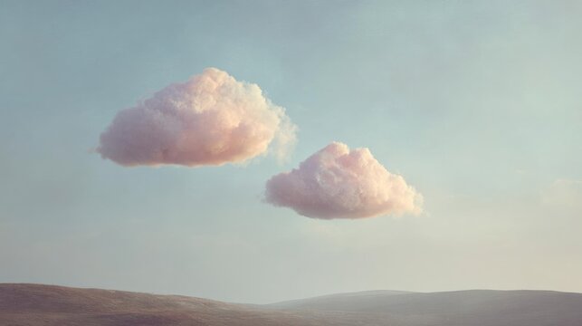 Two large, fluffy clouds floating in the sky. the clouds are light pink in color and appear to be floating above a vast landscape. the sky is a pale blue with a few wispy clouds scattered across it.