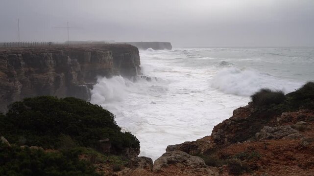 Powerful video capturing the raw force of the Atlantic Ocean as storm-driven waves crash against the cliffs of Sagres in the Algarve, Portugal. Perfect fornature-focused visual storytelling