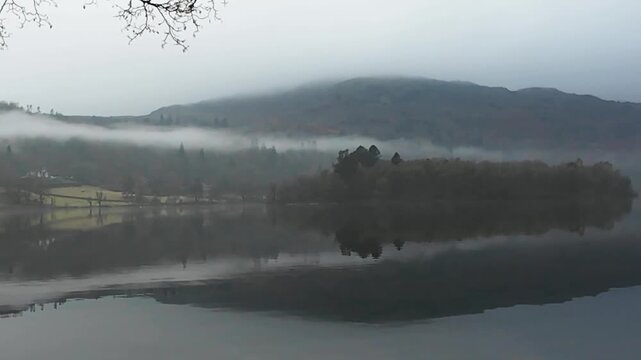 Mist over a lake in Lake District