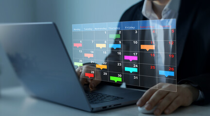 Managing a scheduled meeting.Businessman manages time to work efficiently and on time on all projects. Calendar work schedule, business plan concept.	
