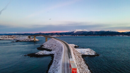 Obraz premium Atlantic Ocean Road in Norway winter landscape. The Atlantic Ocean Road with Storseisundet Bridge in winter (Nordmore, Norway).