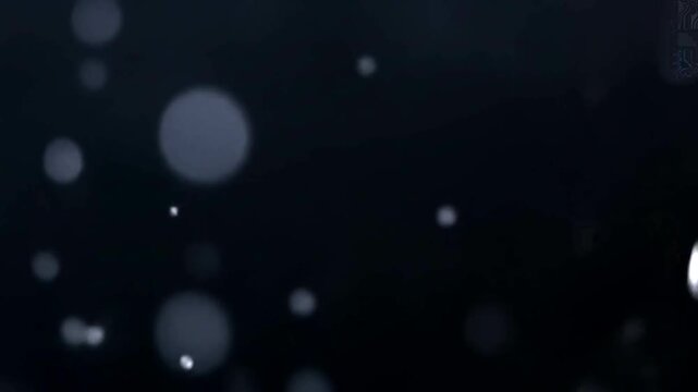 Rain Drops Falling on Dark Surface.