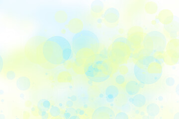 Abstract blurred fresh vivid spring summer light delicate pastel yellow blue white bokeh background texture with bright circular soft color lights. Beautiful backdrop illustration.