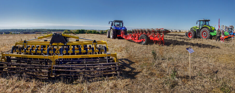 Baykivtsi, Ternopil region, UKRAINE - September 27, 2025: Tractors with harrow, plows at the demonstration of agricultural machinery trailed equipment "Ternopil Agro"