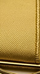 Golden Fabric Texture Close-up Detail.