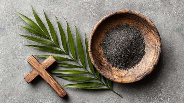 A symbolic arrangement of Ash Wednesday elements on a gray background