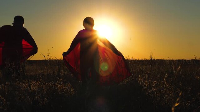 happy family, superheroes child kid superheroes, children playing superhero red cloak, daughter son girl boy running red cloaks park, children running sun, silhouette running child kid sunset, sun kid