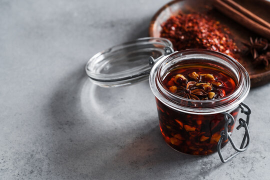 Spicy chili crisp oil sauce with roasted salted peanuts