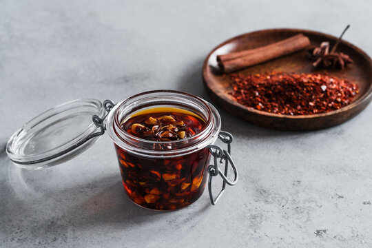 Spicy chili crisp oil sauce with roasted salted peanuts