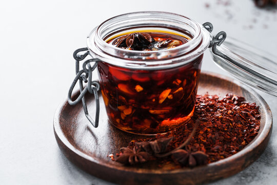 Spicy chili crisp oil sauce with roasted salted peanuts