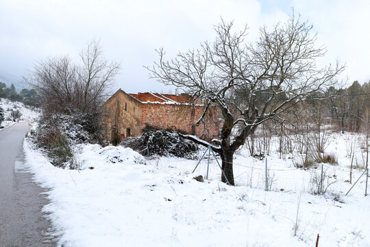 Snowy landscape with beautiful stone houses in Sierra de Alcaraz