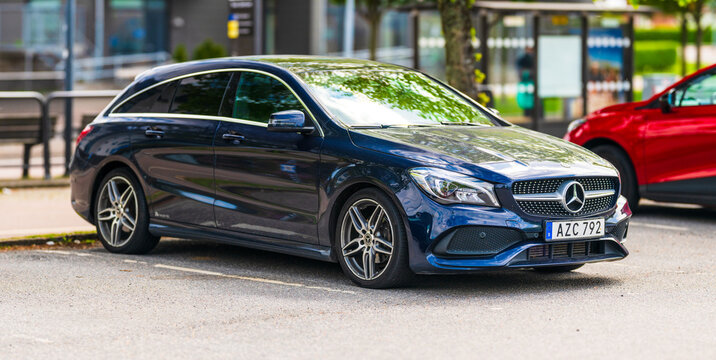 Gothenburg, Sweden - May 10 2025: Dark blue 2019 Mercedes-Benz CLA 200 station wagon parked outdoors.