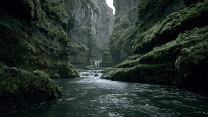 Mystical Gorge with Mossy Cliffs and Waterfall