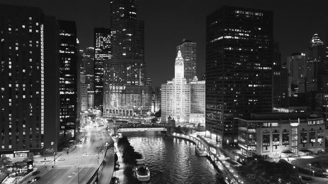 Aerial night view of Chicago skyscrapers from Millennium Park with glowing city lights