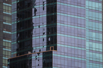 Obraz premium Modern Glass High-Rise Building Facade