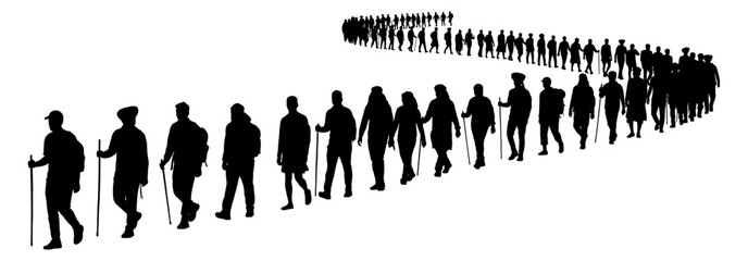 Silhouette of hikers walking with walking sticks