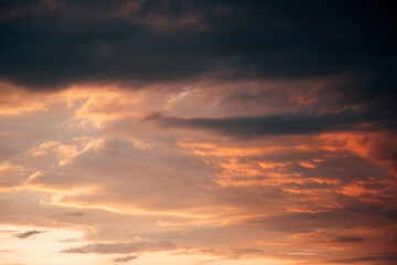 Fototapeta premium Modern Wind Turbines Silhouetted Against a Vibrant Sunset Sky, Renewable Energy Park in Rural Landscape Under Intense Evening Light