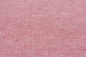 Fototapeta premium Soft pink ribbed knitted fabric with glitter thread for fashion design and sewing hobby