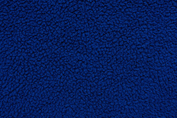 Dark blue fleece textile background for winter sewing and DIY crafts © Iryna Miadzvedzeva