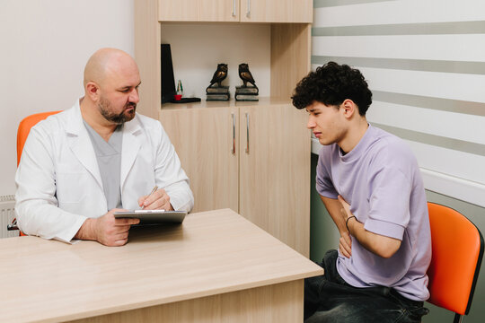 Urology consultation patient discussing urinary symptoms with urologist.