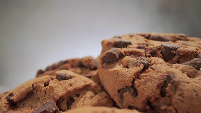 Oatmeal chocolate chip cookies close up with slow moving camera