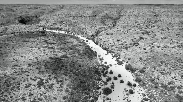Drone shot of Mandu Mandu Creek showing river bends, vegetation, and remote outback scenery