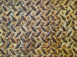 Rusted Steel Diamond Plate Texture from Budapest Ecseri ut Industrial Zone: High-Resolution Weathered Metal Tread Plate with Heavy Oxidation and Gritty Non-Slip Surface Detail for Urban Design Use