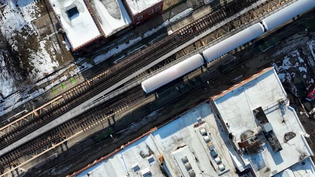 Cinematic 4K Drone Aerial Chicago West Side Flying Over CTA Green Line 'L' Train Tracks in Garfield Park
