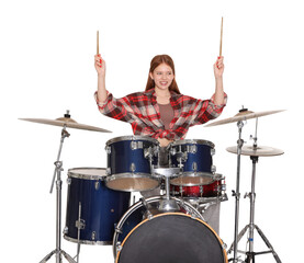 Teenage girl with drumsticks and drums on white background